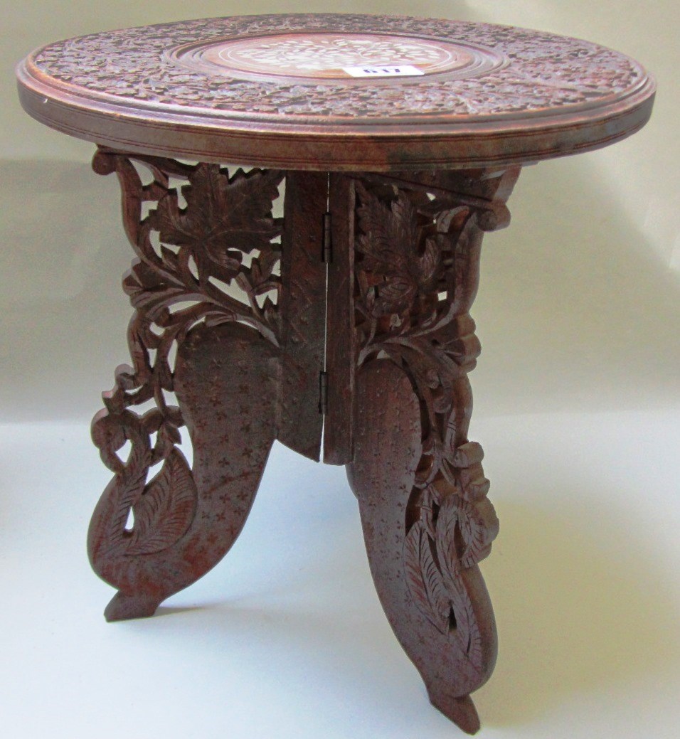 Appraisal: An small Eastern bone inlaid hardwood occasional table with circular