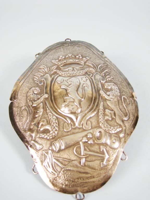 Appraisal: A white metal Breast Plate embossed coat of arms with