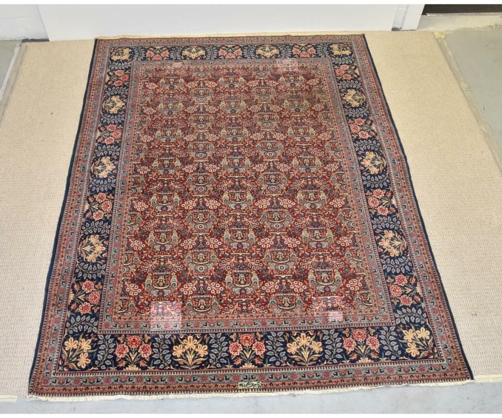 Appraisal: Persian Kashan room size carpet red field floral patterns blue