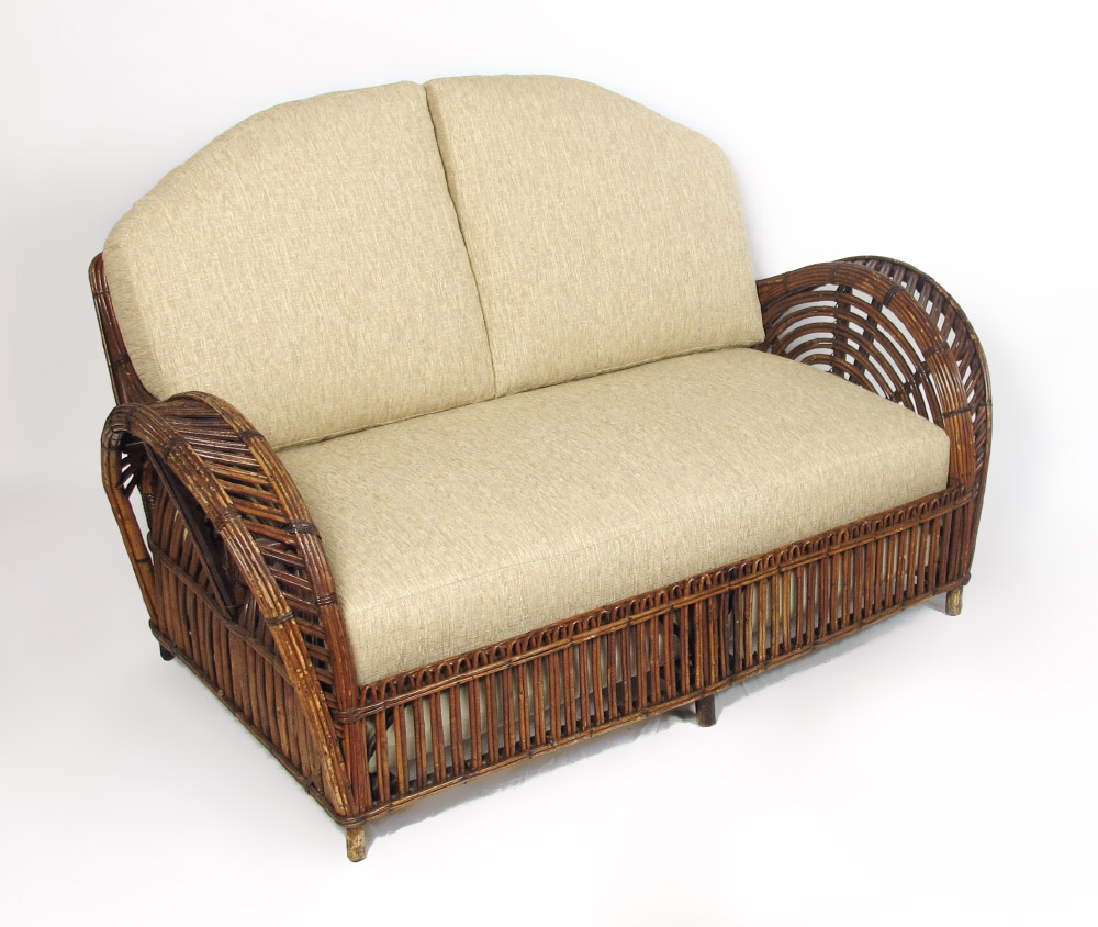 Appraisal: FRANCO ALBINI RATTAN SOFA Peacock design with newly upholstered back