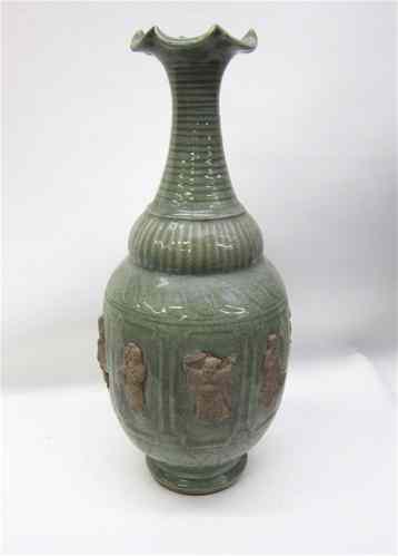 Appraisal: CHINESE POTTERY VASE with green slip glaze and applied earthenware