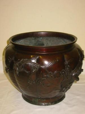 Appraisal: A JAPANESE BRONZE JARDINIERE of lobed tapering form with moulded