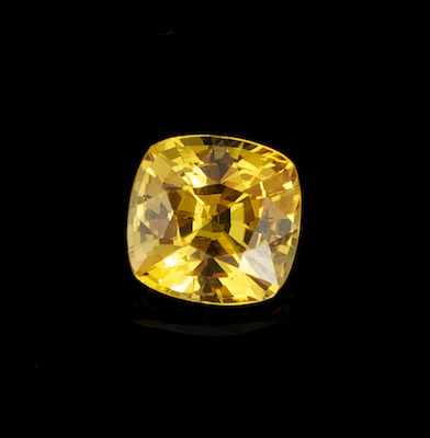 Appraisal: An Unmounted Fancy Yellow Sapphire Carat Cushion cut weighting ct