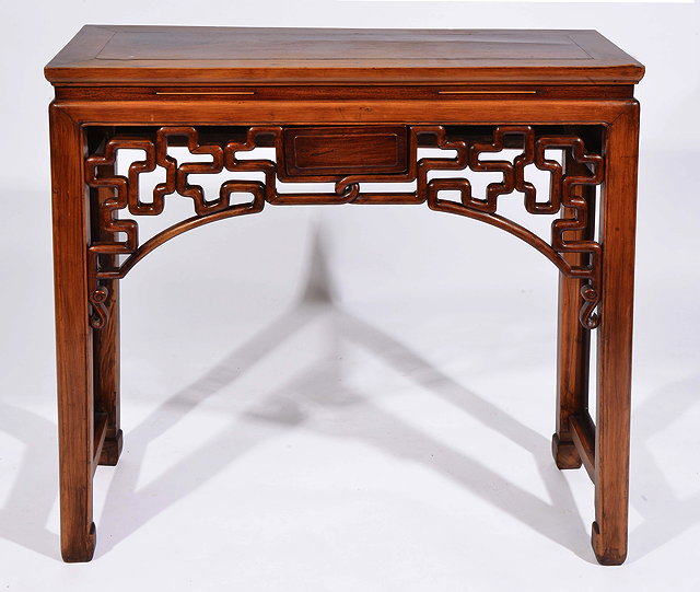 Appraisal: A CHINESE HARDWOOD SIDE TABLE with pierced lattice work decoration