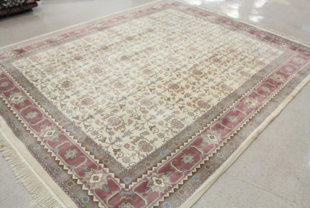 Appraisal: A CONTEMPORARY HAND KNOTTED ORIENTAL CARPET Indo-Persian overall floral design