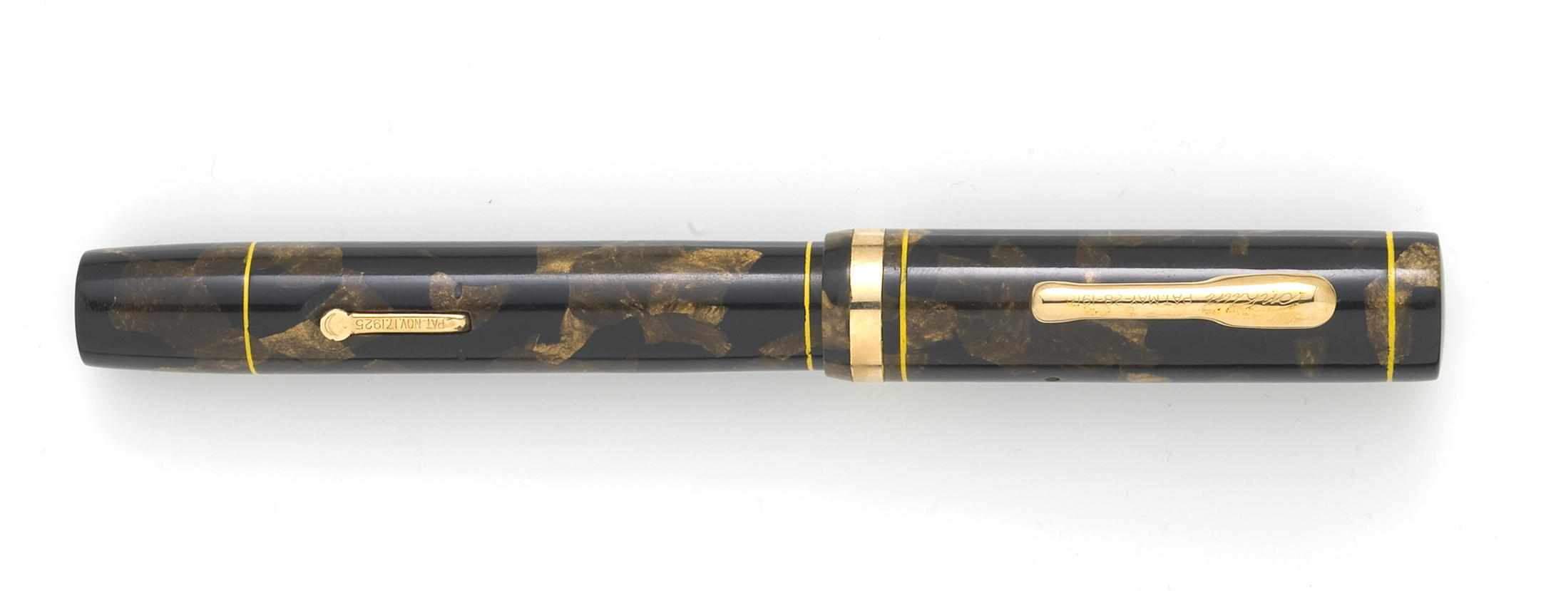 Appraisal: CONKLIN Senior Endura Fountain Pen Brown and black marbled celluloid