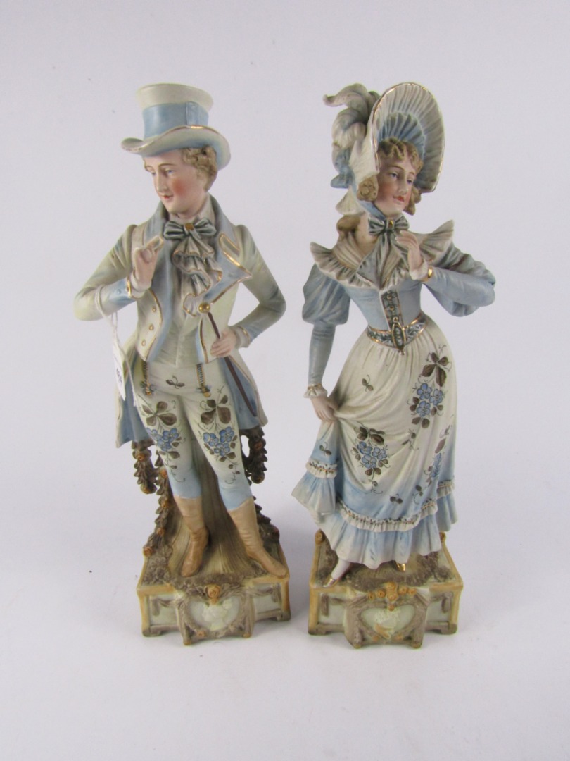 Appraisal: A pair of French late thC bisque porcelain figures modelled