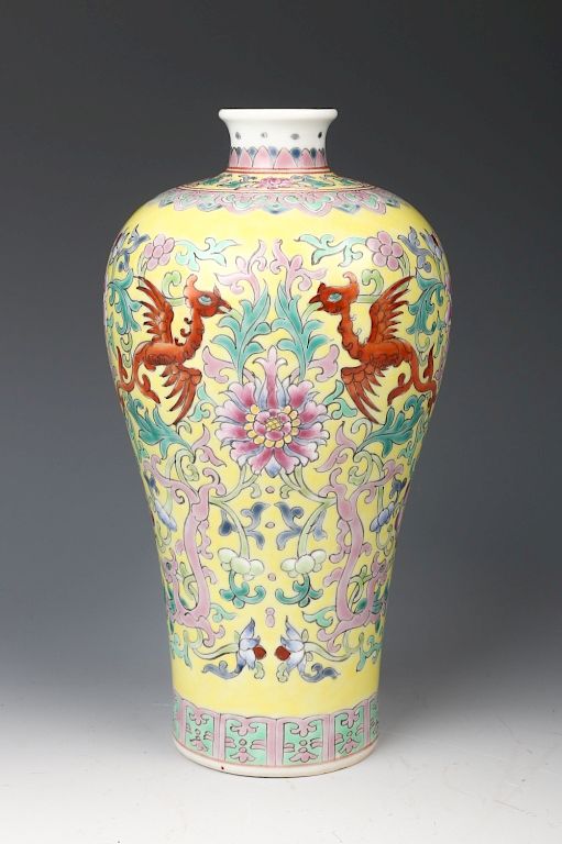 Appraisal: YELLOW GROUND FAMILLE-ROSE VASE GUANGXU MARK Of baluster form rising