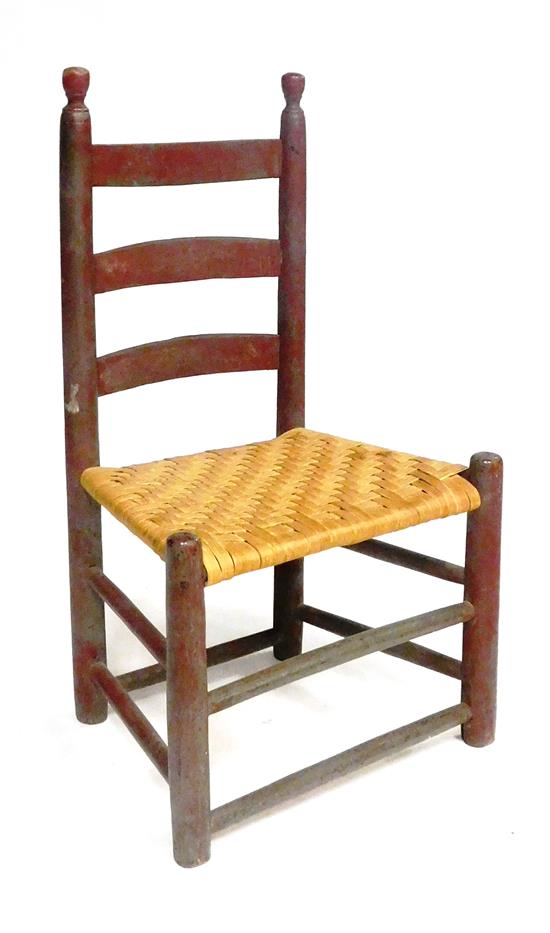 Appraisal: th C child's ladderback chair caned seat remnants of original