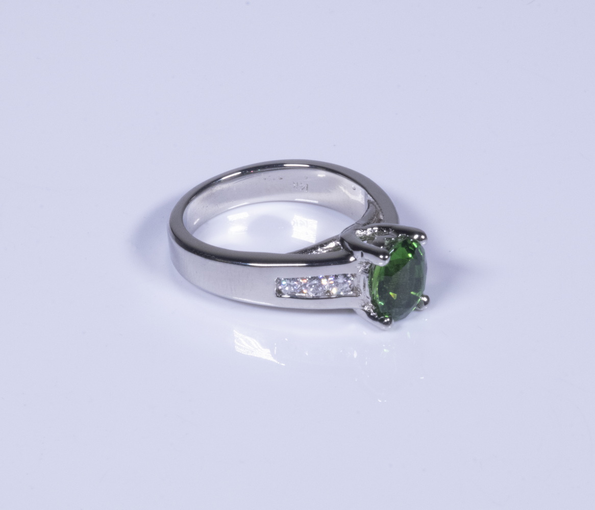 Appraisal: K WHITE GOLD DIAMOND AND GREEN TOURMALINE RING Contemporary design