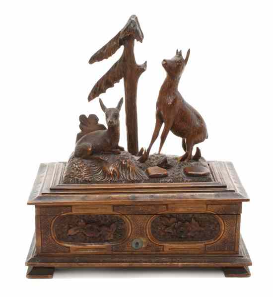 Appraisal: A Black Forest Carved Wood Music Box having two deer