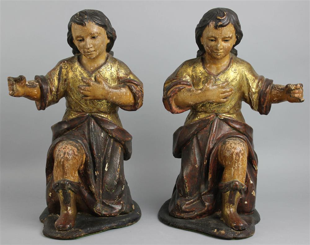 Appraisal: PAIR OF POLYCHROME AND GILTWOOD KNEELING ANGELS SPANISH TH TH