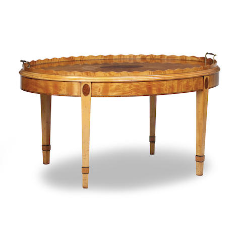 Appraisal: A SATINWOOD AND ROSEWOOD BANDED TRAY-TOP TABLE The oval twin-handled