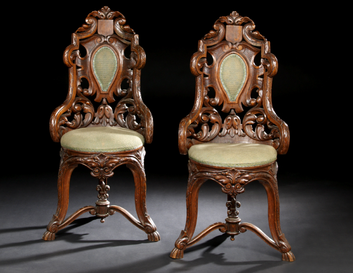 Appraisal: Pair of Austro-German Carved Oak Hall Chairs mid- th century