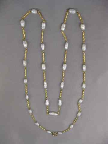 Appraisal: Pearl k Gold Necklace silver grey river pearls yellow gold