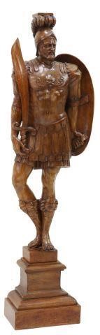 Appraisal: Continental carved walnut figure of a Roman soldier th c