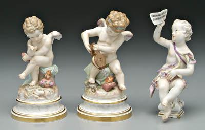 Appraisal: Three porcelain figurines two Meissen with cupids one holding heart