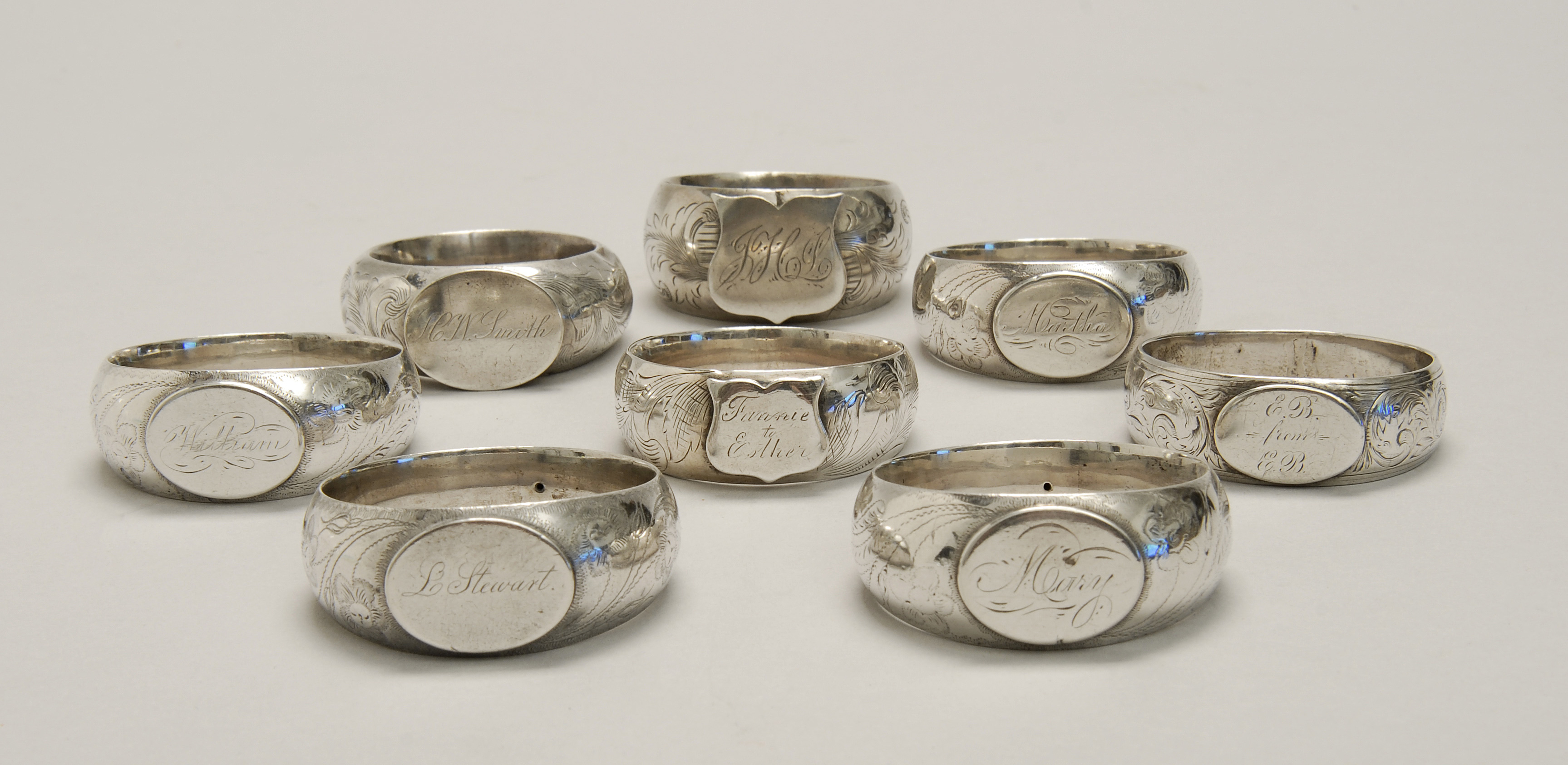 Appraisal: EIGHT AMERICAN SILVER NAPKIN RINGS Circa sIn circular form with