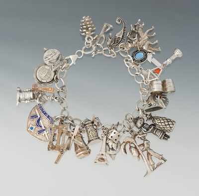 Appraisal: A Sterling Silver Charm Bracelet Sterling silver bracelet fitted with