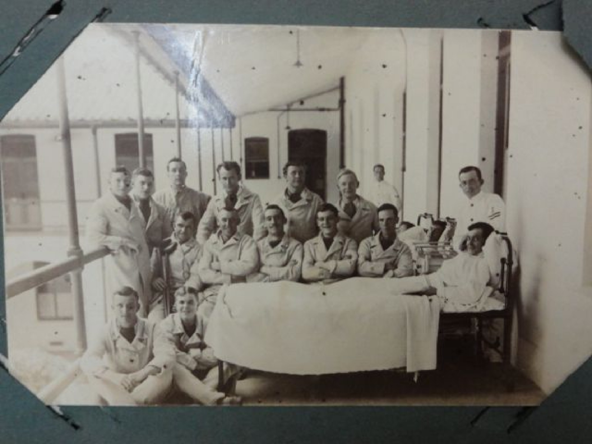 Appraisal: An Edwardian postcard album showing family group shots military photographs