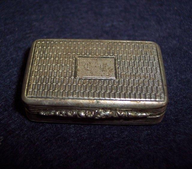 Appraisal: A William IV snuff box engine turned and with floral