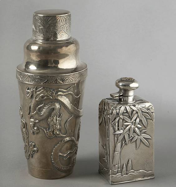 Appraisal: A Japonism sterling flask together with a white metal cocktail