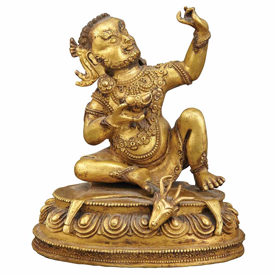 Appraisal: Tibetan Gilt-Bronze Wrathful Deity Seated in a position of ease