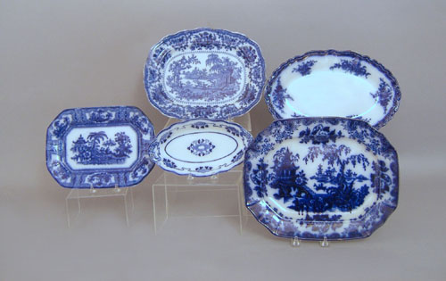 Appraisal: Five flow blue trays th c largest - l w