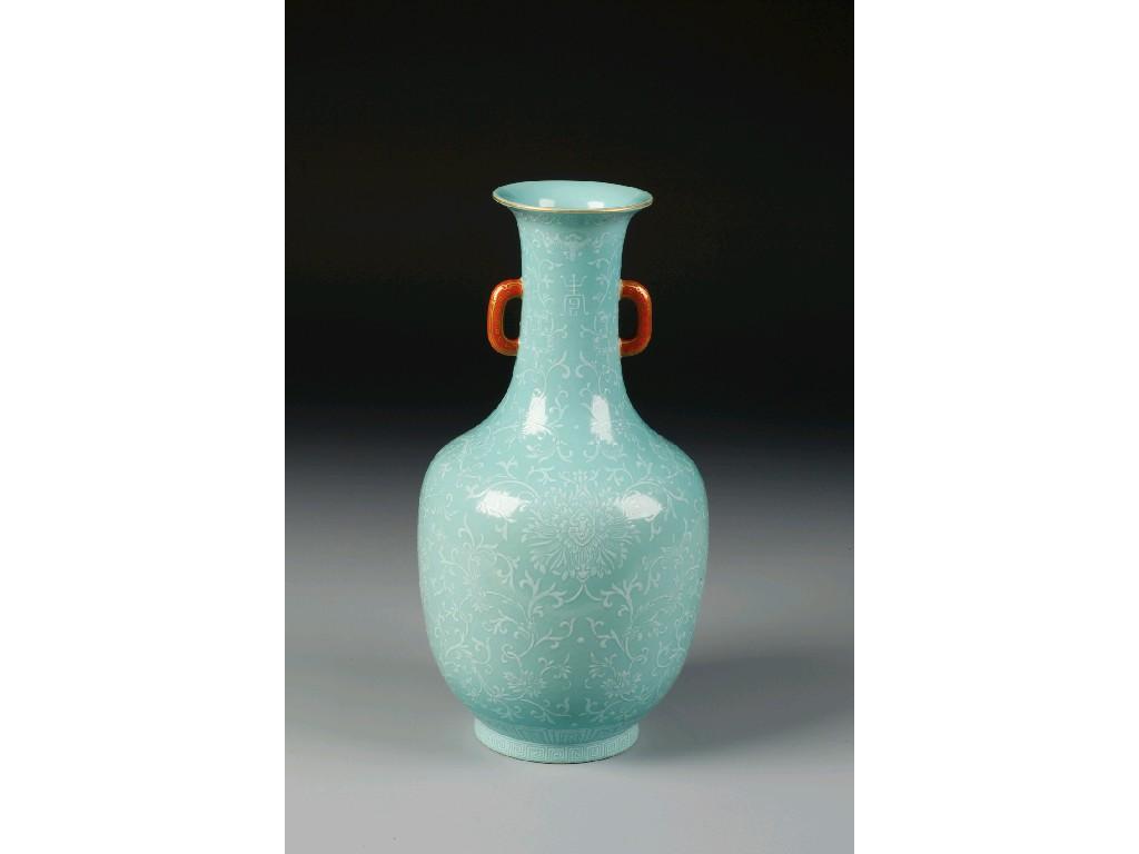 Appraisal: A CHINESE TURQUOISE GLAZED VASE overpainted in white enamel with