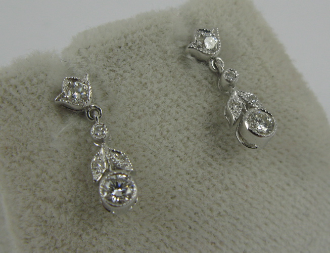 Appraisal: PAIR OF DIAMOND K WHITE GOLD DANGLE EARRINGS each set