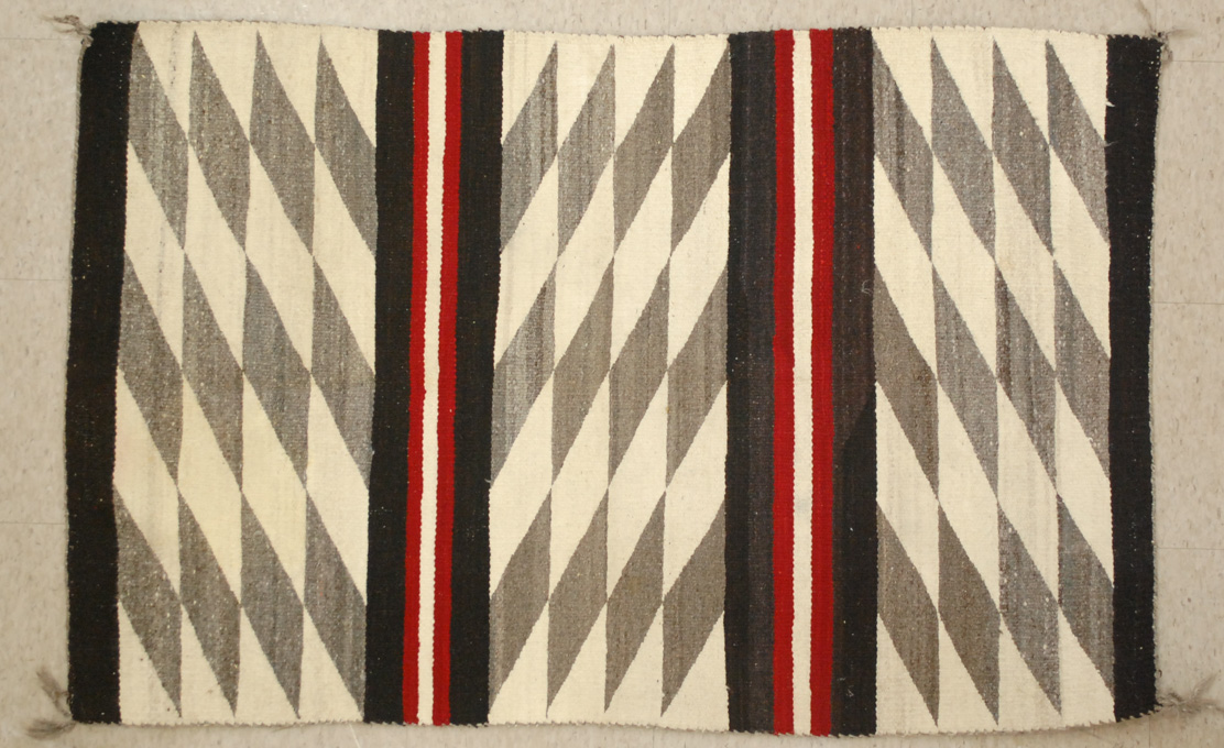 Appraisal: NAVAJO WEAVING having three individual areas of gray and ivory