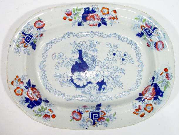 Appraisal: th Century oval ironstone serving plate printed with blue flowers