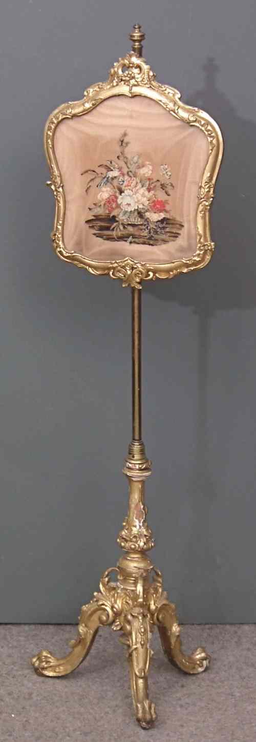 Appraisal: A th Century gilt pole screen on shaped cabriole legs