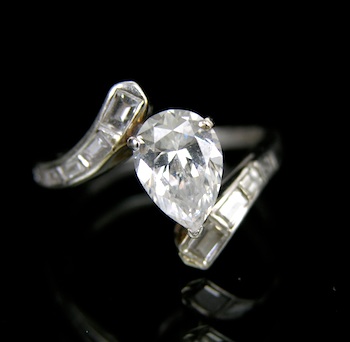 Appraisal: A Platinum and Diamond Setting A stamped platinum ring set