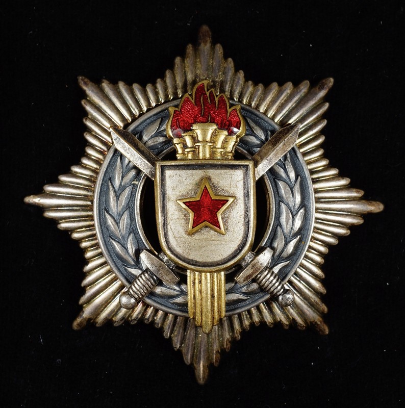 Appraisal: Soviet military medal with crossed sabres over torches on a