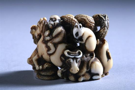 Appraisal: JAPANESE IVORY OKIMONO Meiji period signed Carved to depict the