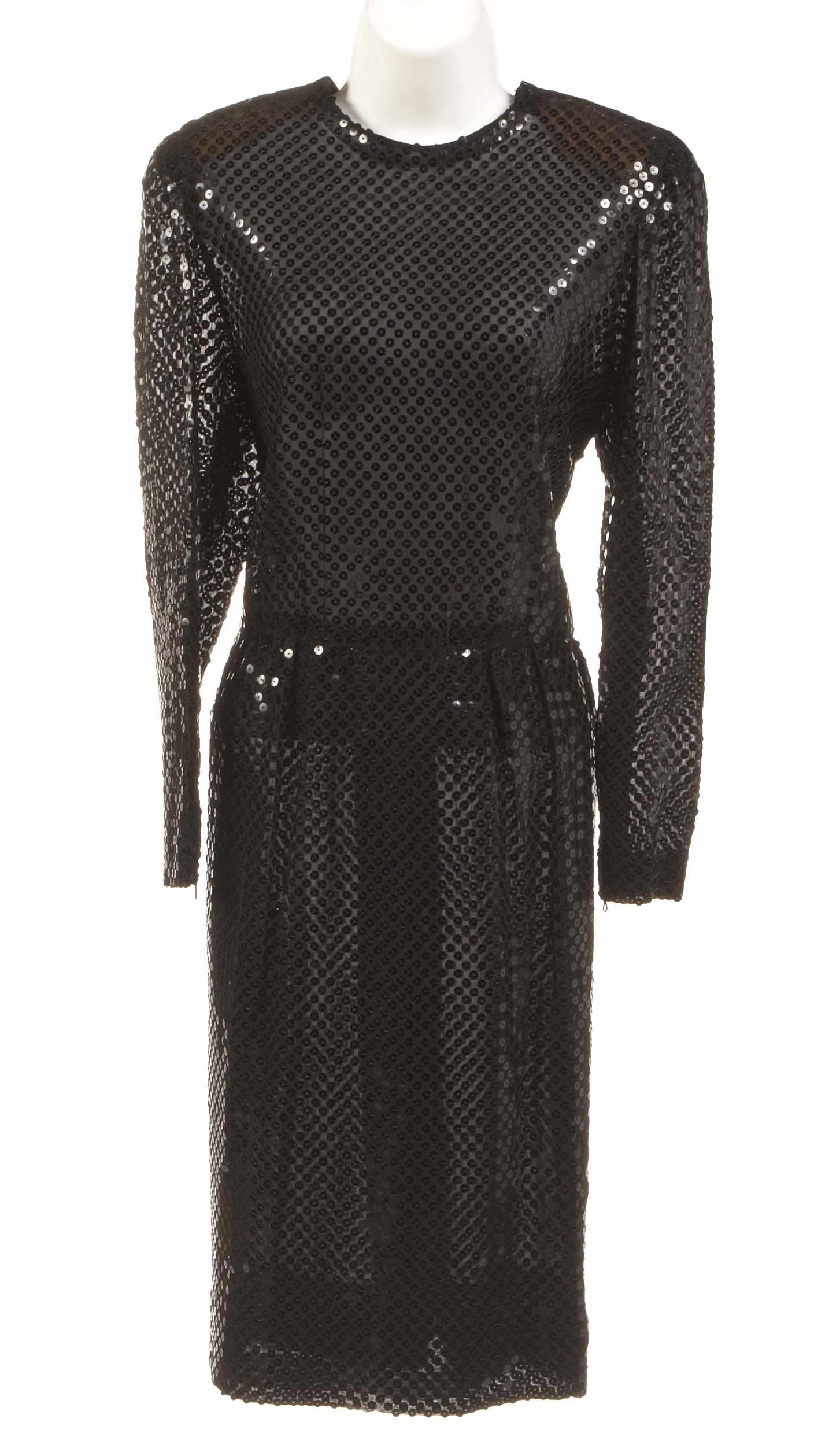 Appraisal: A Givenchy black sequin long sleeve dress together with a