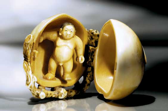 Appraisal: CARVED IVORY NETSUKE Well carved and unusual ivory netsuke in