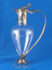 Appraisal: An Art Nouveau silver mounted claret jug the tapering body