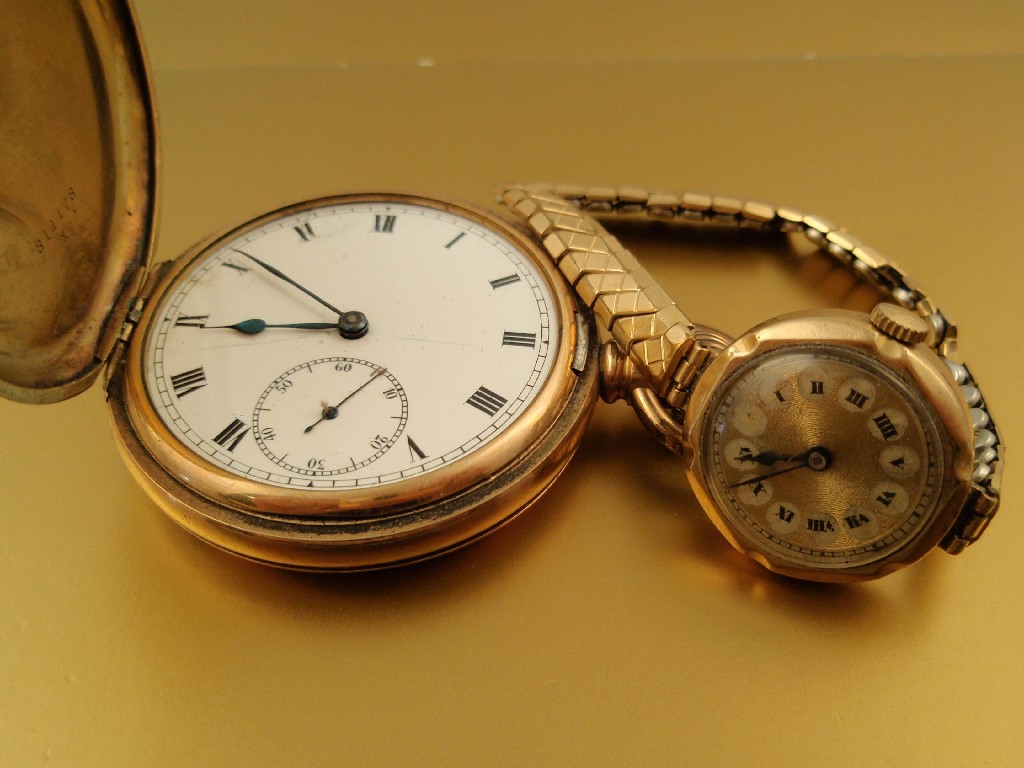 Appraisal: A ladies gold cased 's wristwatch and a gold plated