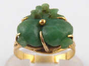 Appraisal: A yellow metal tests carat gold jade ring jade approx