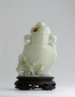 Appraisal: A Chinese pale celadon jade ovoid vase and cover of