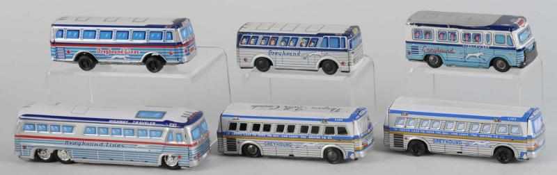 Appraisal: Lot of Tin Litho Greyhound Bus Friction Toys Description Japanese