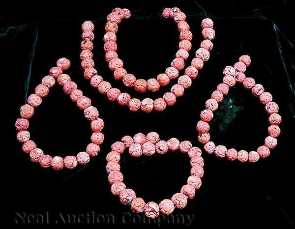 Appraisal: A Group of One Hundred Thirteen Chinese Coral Beads carved