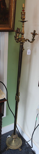 Appraisal: AN OLD BRASS THREE BRANCH FOUR LIGHT LAMP STANDARD with