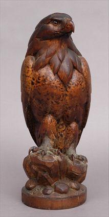 Appraisal: GERMAN CARVED WALNUT FIGURE OF AN EAGLE The head with