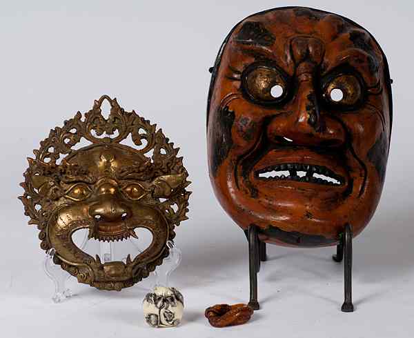 Appraisal: Japanese Masks and Netsukes Japanese an assembled group including a