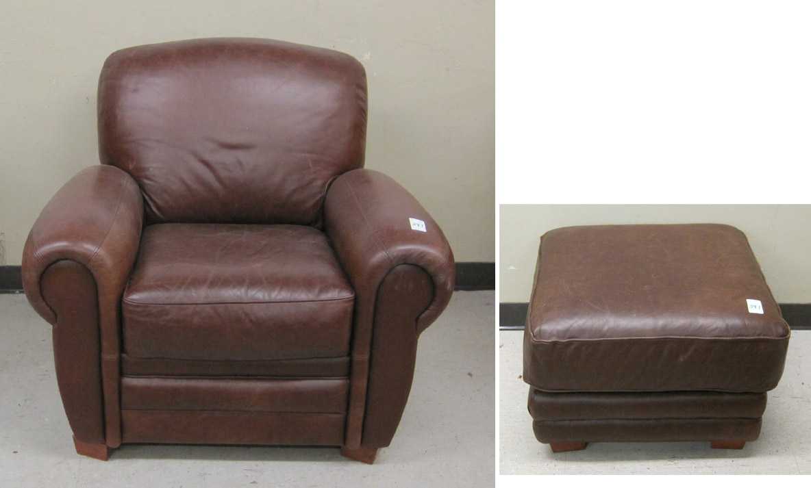 Appraisal: A CONTEMPORARY LEATHER CHAIR AND OTTOMAN Calia Italia Italy recent