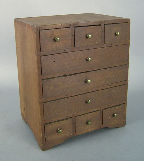 Appraisal: Pennsylvania pine and poplar jewelry cabinet th c retaining an