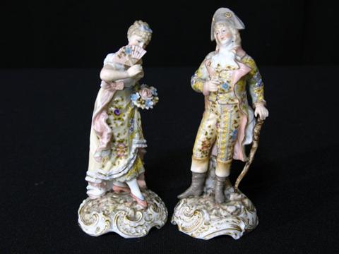 Appraisal: PAIR OF MAN AND WOMAN FIGURINES Each with a lamb